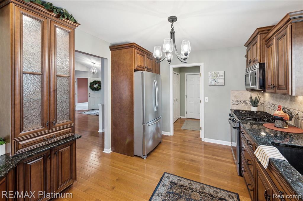 585 Snowfall Court, Howell, MI 48843 — Photo 15