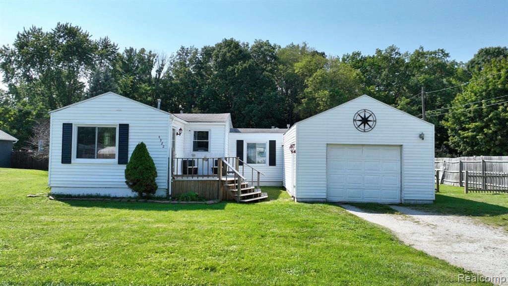 4322 GREENLY Street, Burton, MI 48529 — front exterior