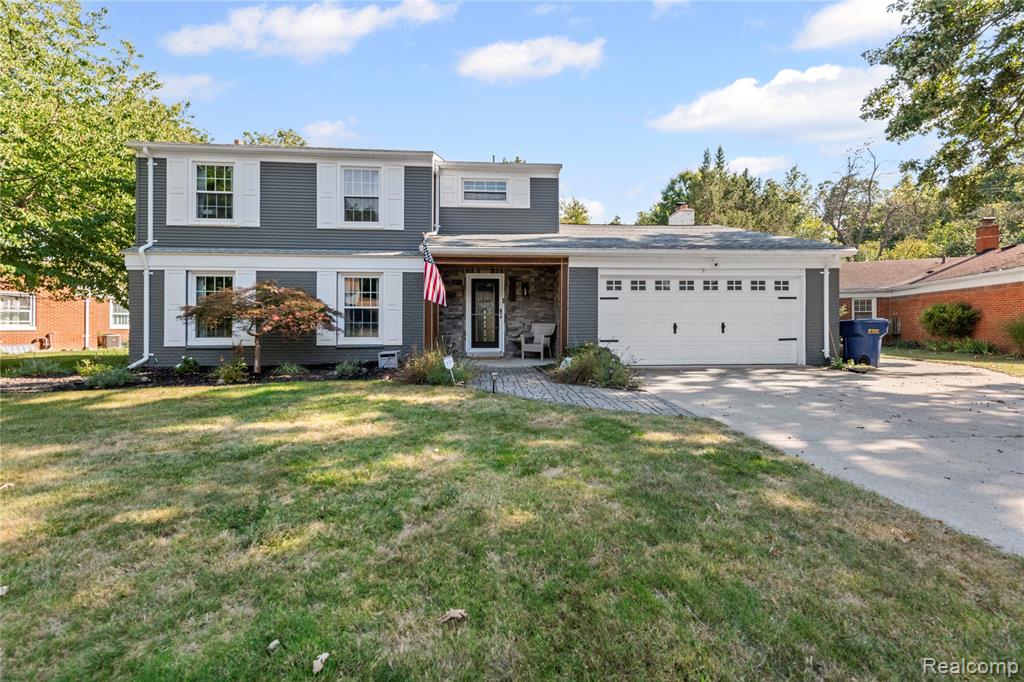 8173 Wood Drive, Grosse Ile, MI 48138 — front exterior