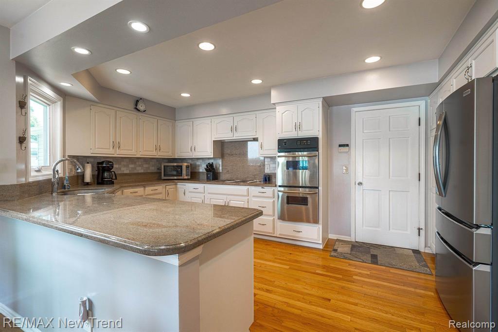 6768 HATCHERY Road, Waterford, MI 48327 — Photo 19