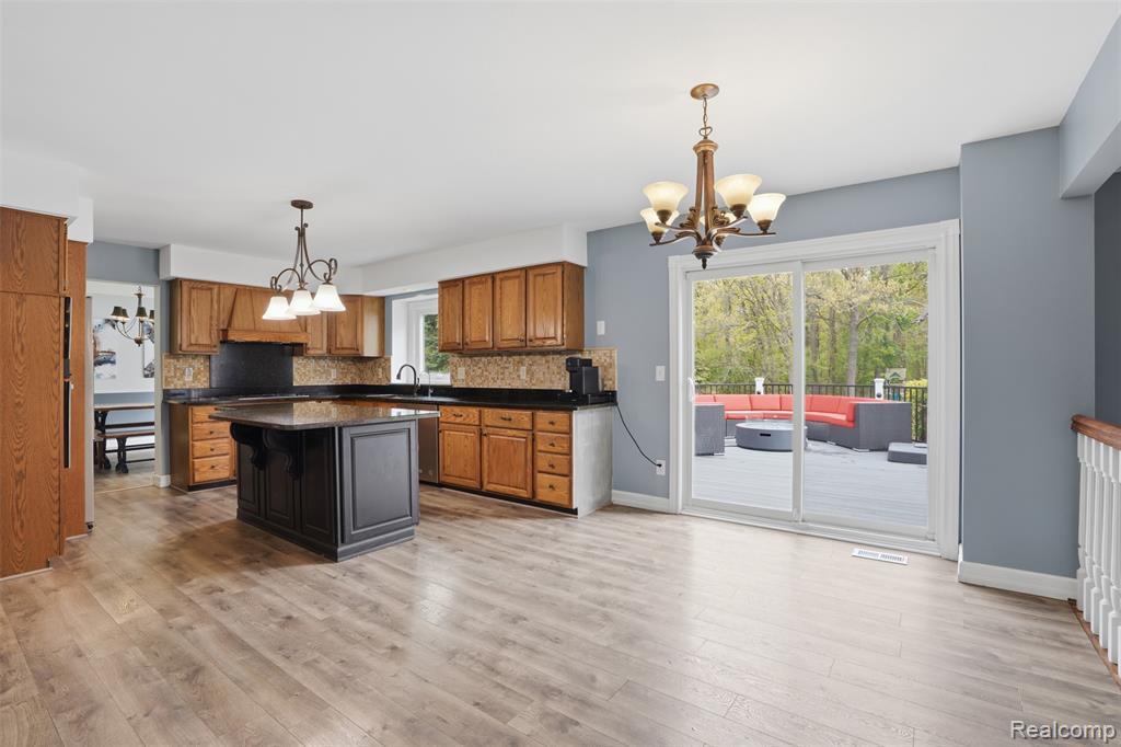 8876 Wintercove Drive, Commerce Twp, MI 48382 — Photo 30