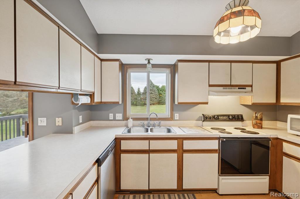 5920 W Coon Lake Road, Howell, MI 48843 — Photo 16