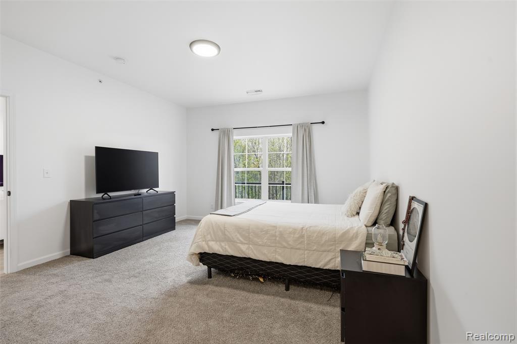 606 Pointe Drive, Walled Lake, MI 48390 — Photo 19
