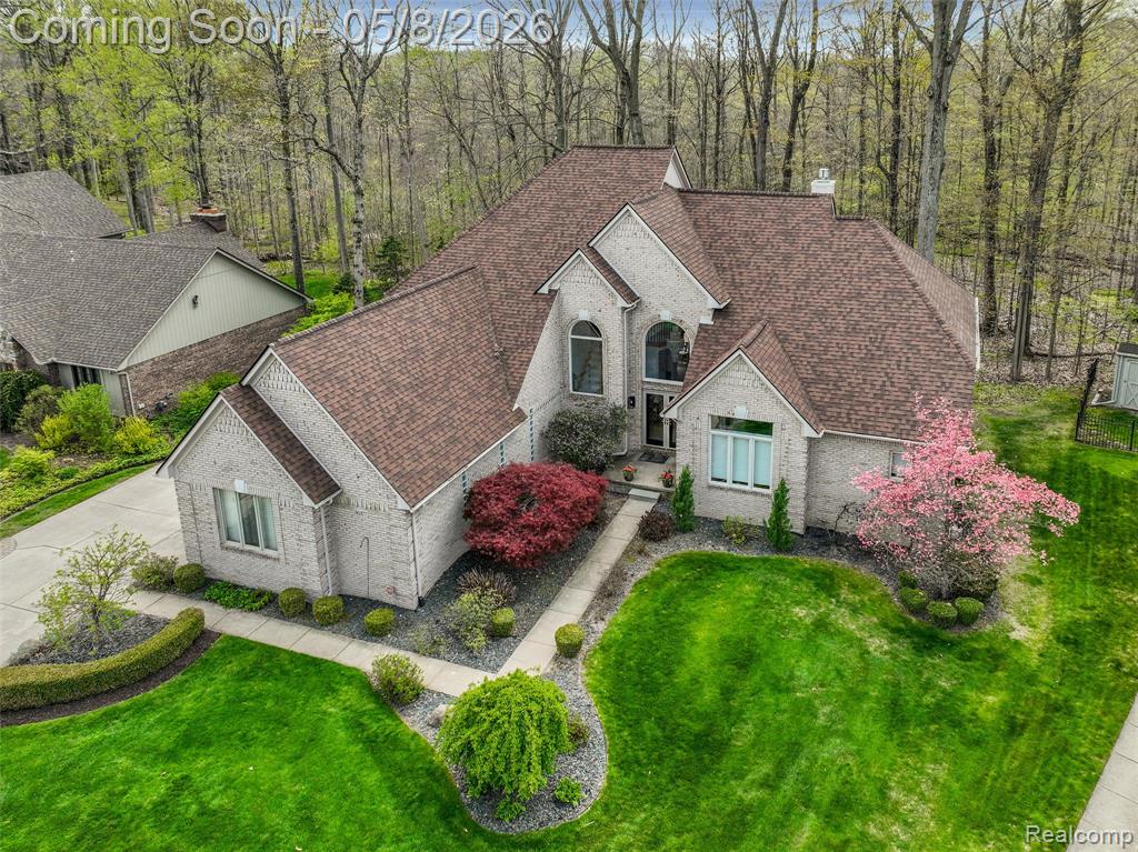56377 Copperfield Drive, Shelby Twp, MI 48316 — front exterior