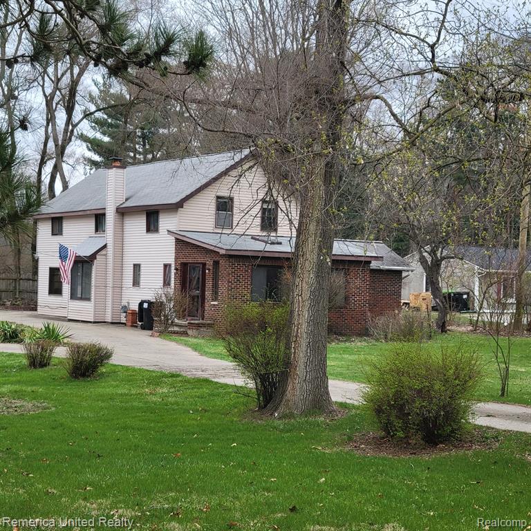 4342 PLEASANT VALLEY Road, Brighton, MI 48114 — front exterior