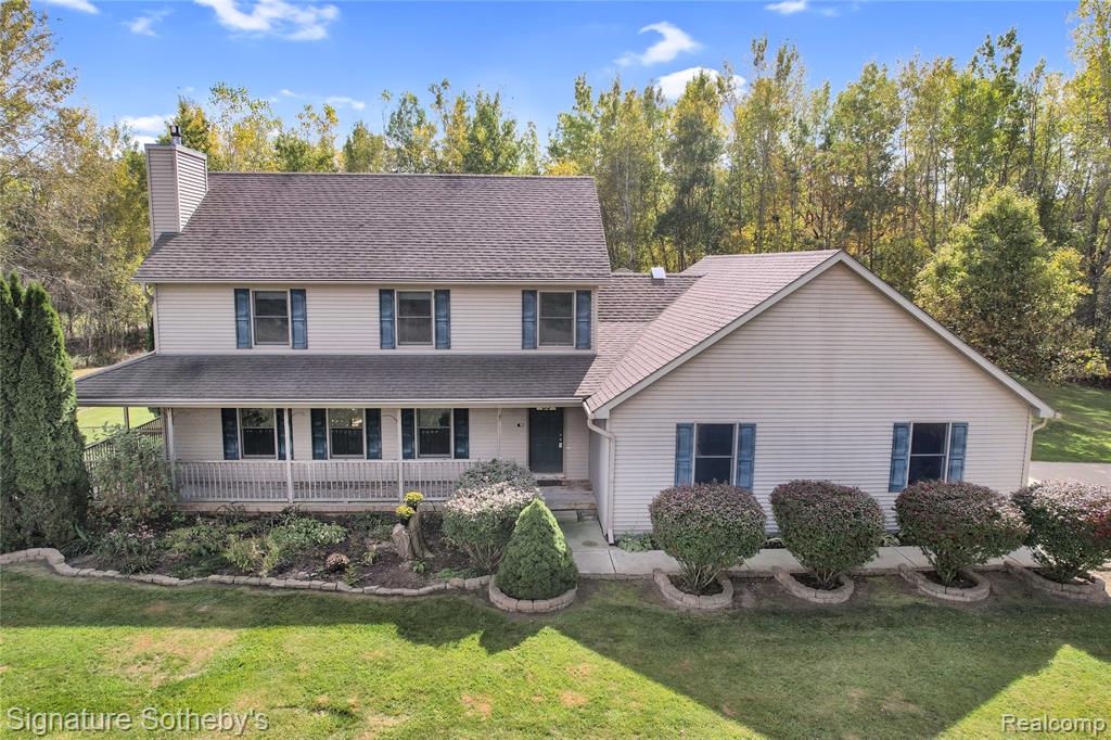 11275 W Coon Lake Road, Webberville, MI 48892 — front exterior