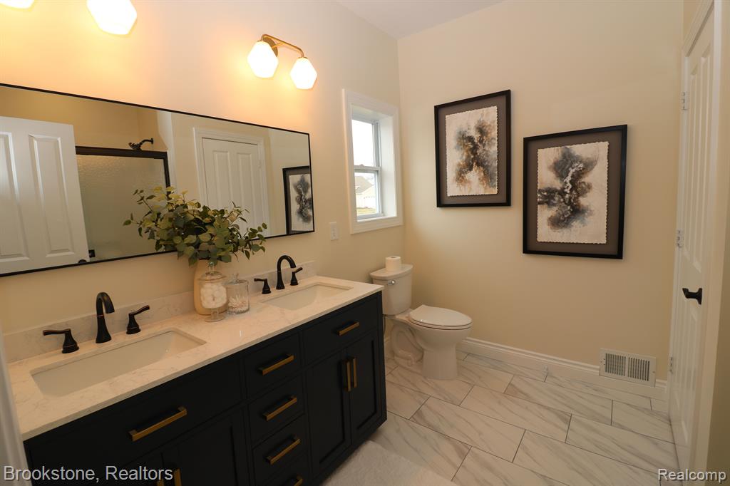 395 GENEVA Court, Howell, MI 48855 — Photo 13