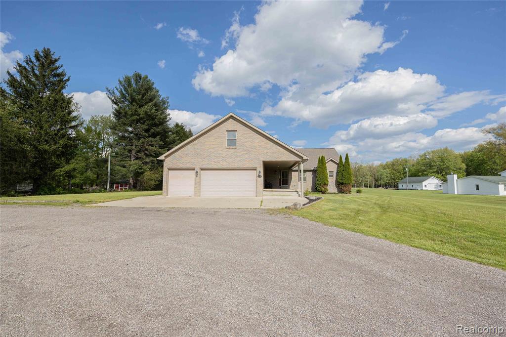 21855 Huron River Drive, New Boston, MI 48164 — front exterior