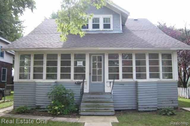 611 FLETCHER Street, Owosso, MI 48867 — front exterior
