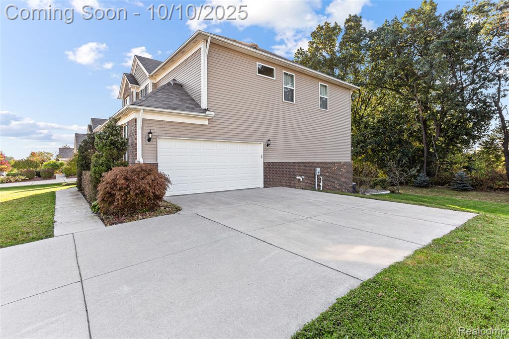 57797 Village Drive, New Hudson, MI 48165 — Photo 42