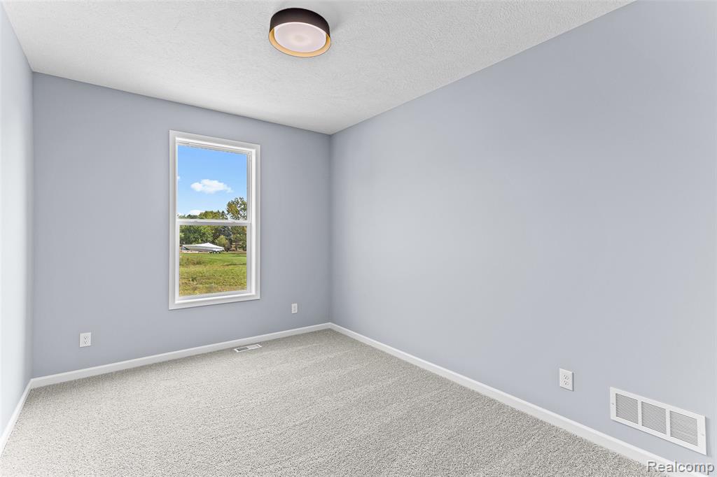 711 W Windward Way, Perry, MI 48872 — Photo 11