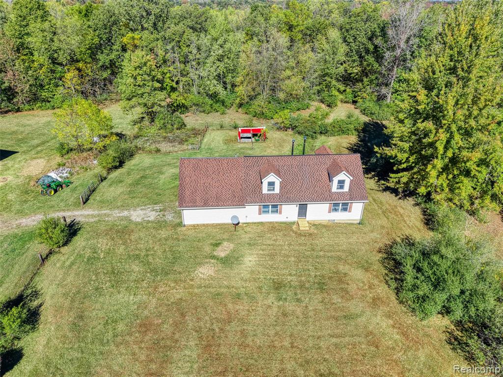 13201 Rockwell Road, Stockbridge, MI 49285 — front exterior