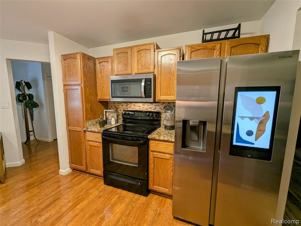 840 Woodridge Hills Drive, Brighton, MI 48116 — Photo 37