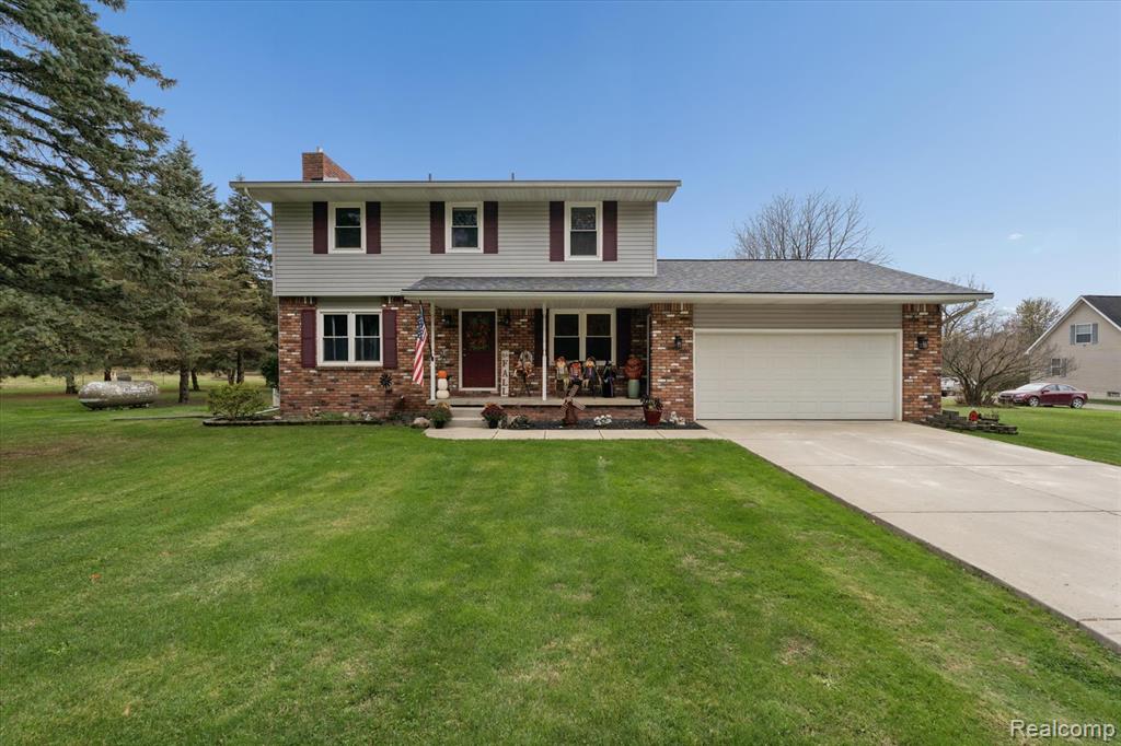 7233 W Lange Road, Fowlerville, MI 48836 — front exterior