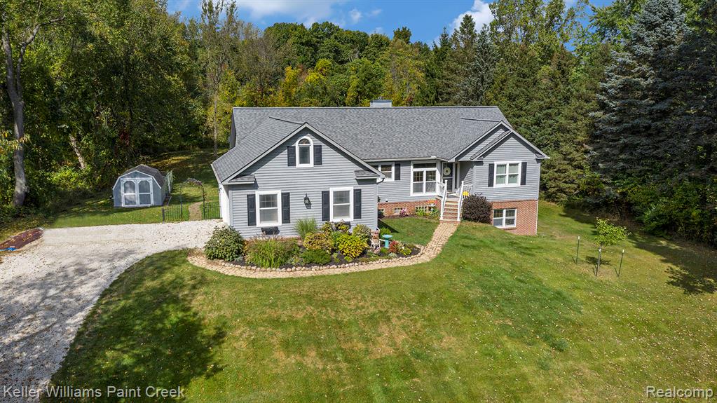 665 Rolling Acres Drive, Ortonville, MI 48462 — front exterior