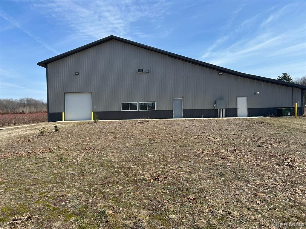 6080 Jensen Road, Fruitport, MI 49415 — front exterior