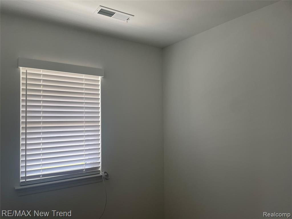 205 Monument Lane, Wixom, MI 48393 — Photo 24
