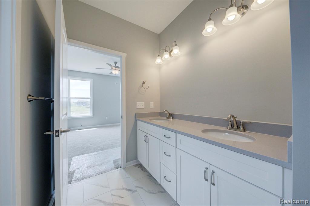 659 ROUND ROCK DR, Howell, MI 48843 — Photo 17
