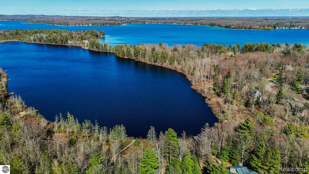 9086 N TOTTENHAM Drive, Traverse City, MI 49685 — Photo 17