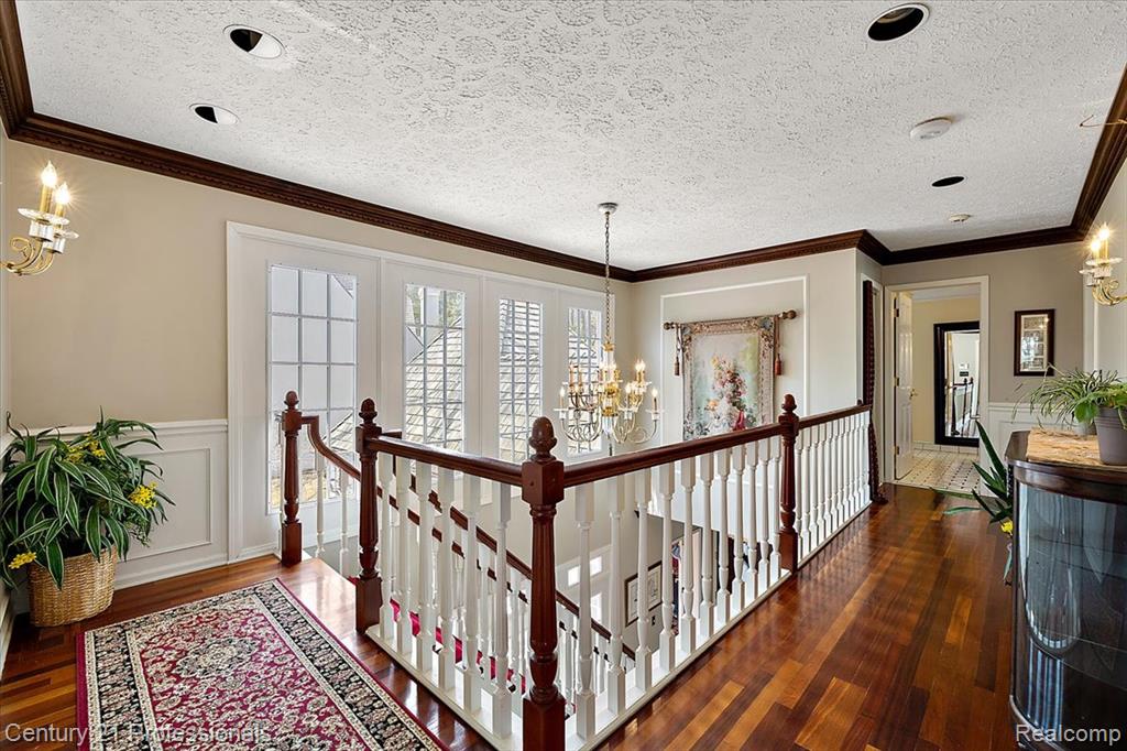 Elegant Upstairs Hall-Cherry Flooring,Wainscoting
