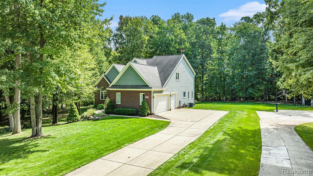 1799 Elkridge Circle, Highland, MI 48356 — Photo 3