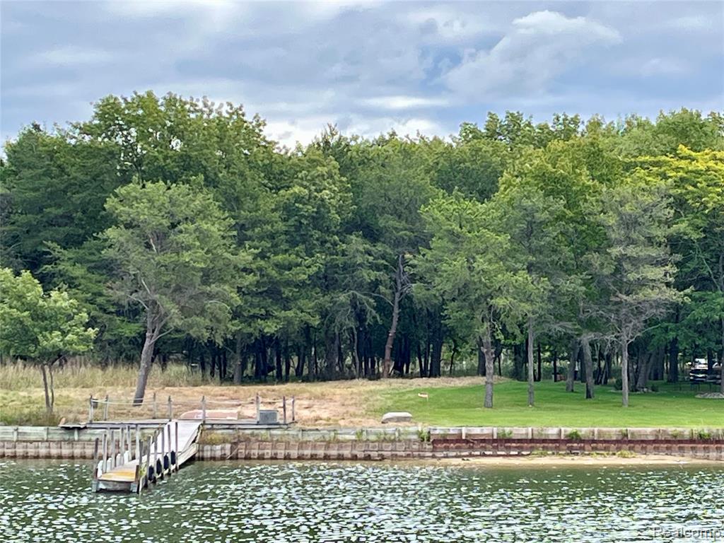9857 Whispering Pines, MI — front exterior