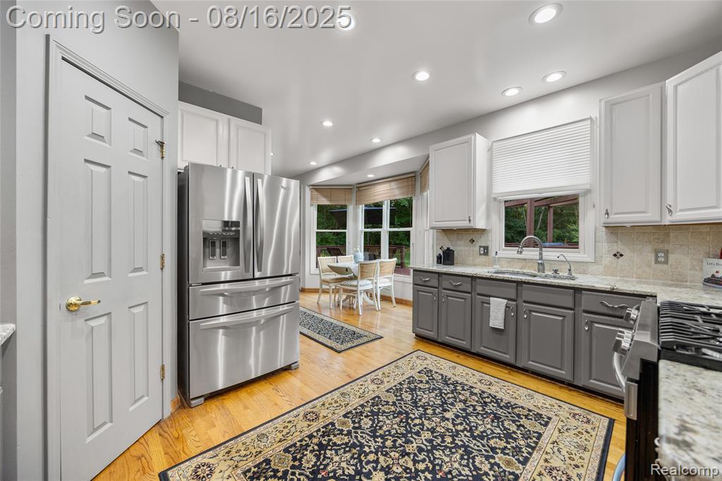7085 Hickory Hollow Circle, Clarkston, MI 48348 — Photo 18