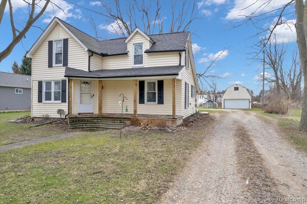 735 N MAIN Street, Almont, MI 48003 — front exterior