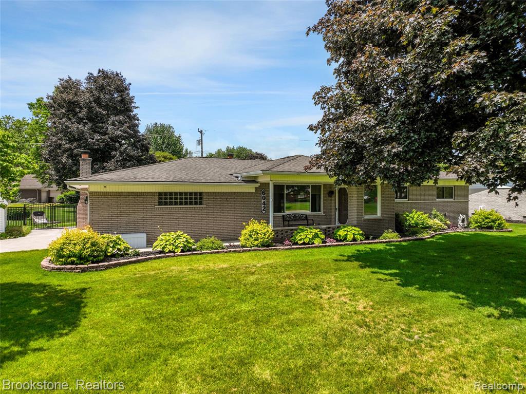 6042 Ravenswood Drive, Utica, MI 48316 — front exterior