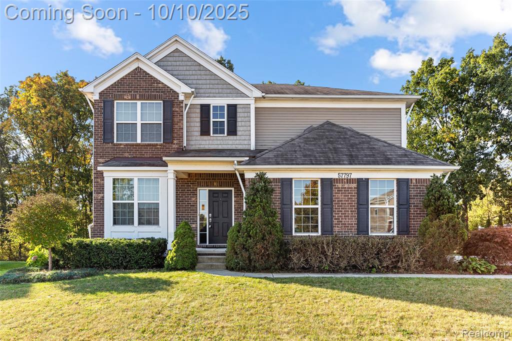 57797 Village Drive, New Hudson, MI 48165 — front exterior