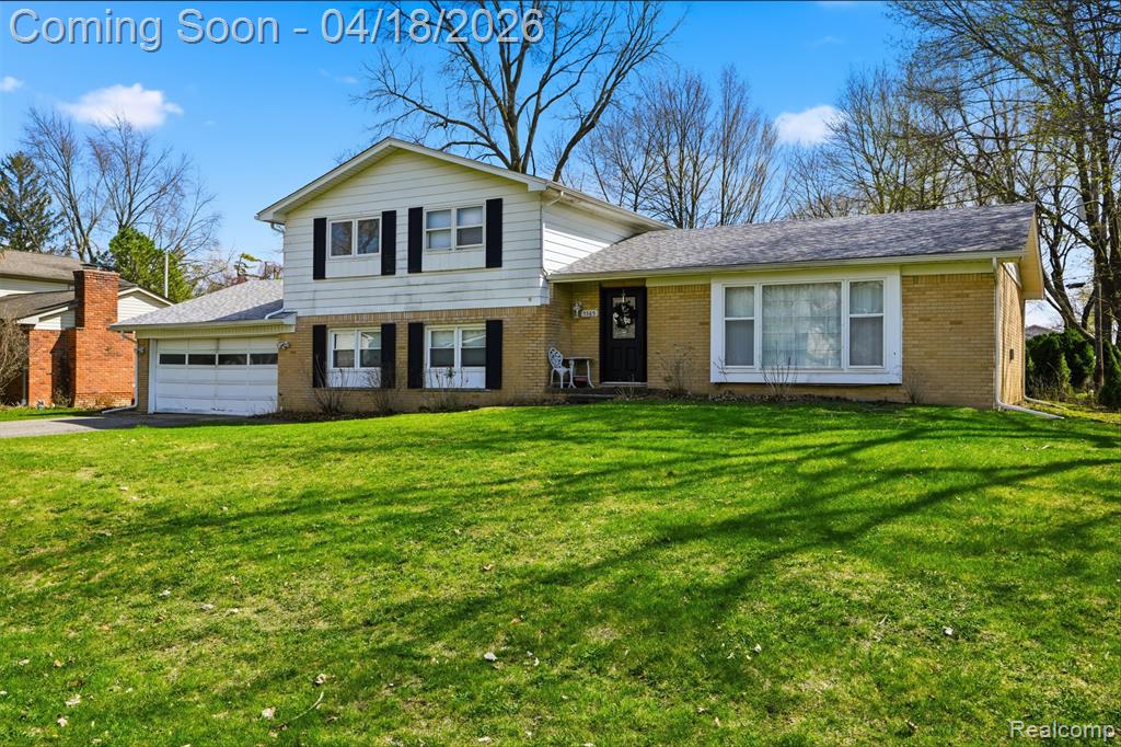 5585 Castleton Drive, West Bloomfield, MI — front exterior