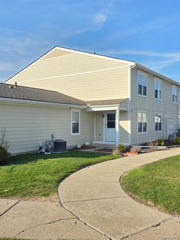39845 Village Wood Lane, 379, Novi, MI — front exterior