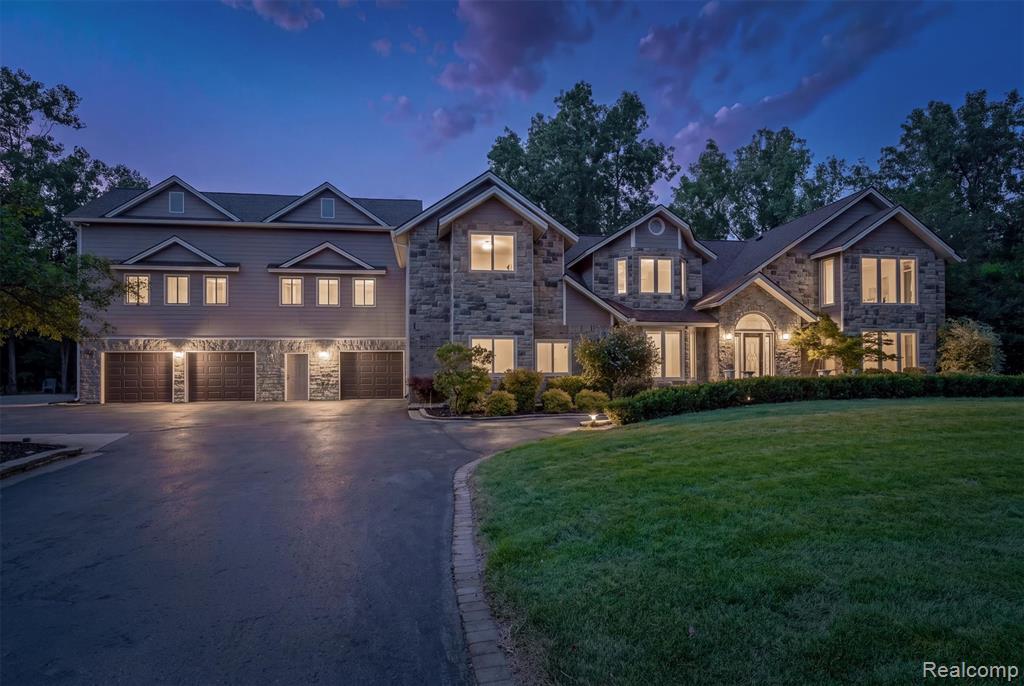 Stone and siding exterior with multiple gables