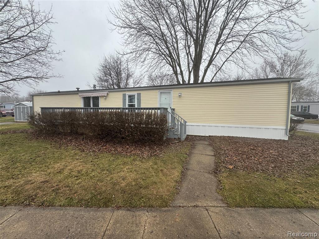 61 Beejay Dr, Lansing, MI 48906 — front exterior