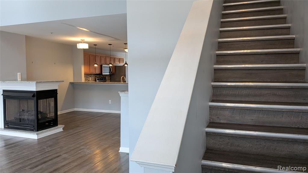413 VILLAGE Drive, Walled Lake, MI 48390 — Photo 20