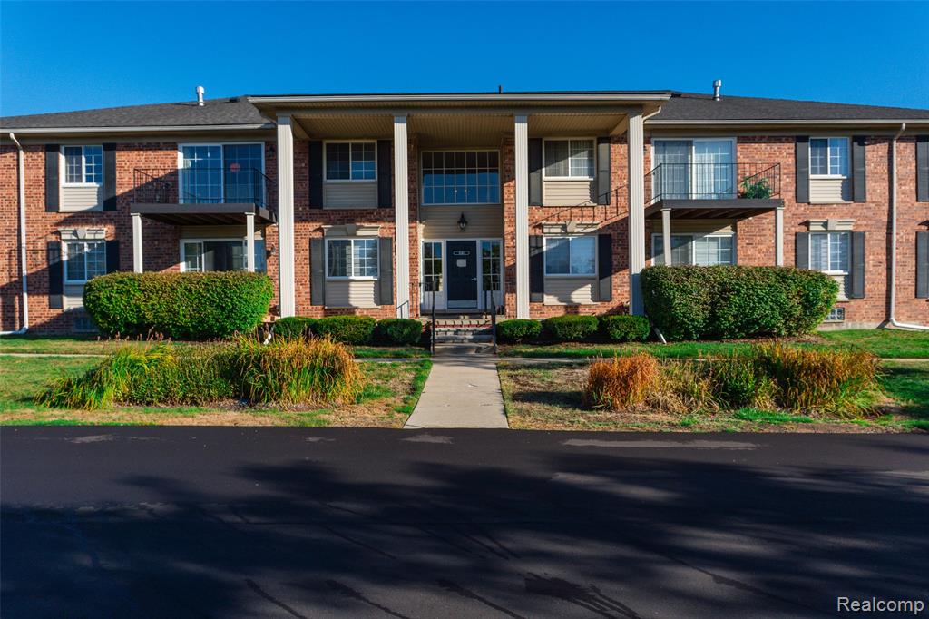 6145 Orchard Lake Road, 204, West Bloomfield, MI — front exterior