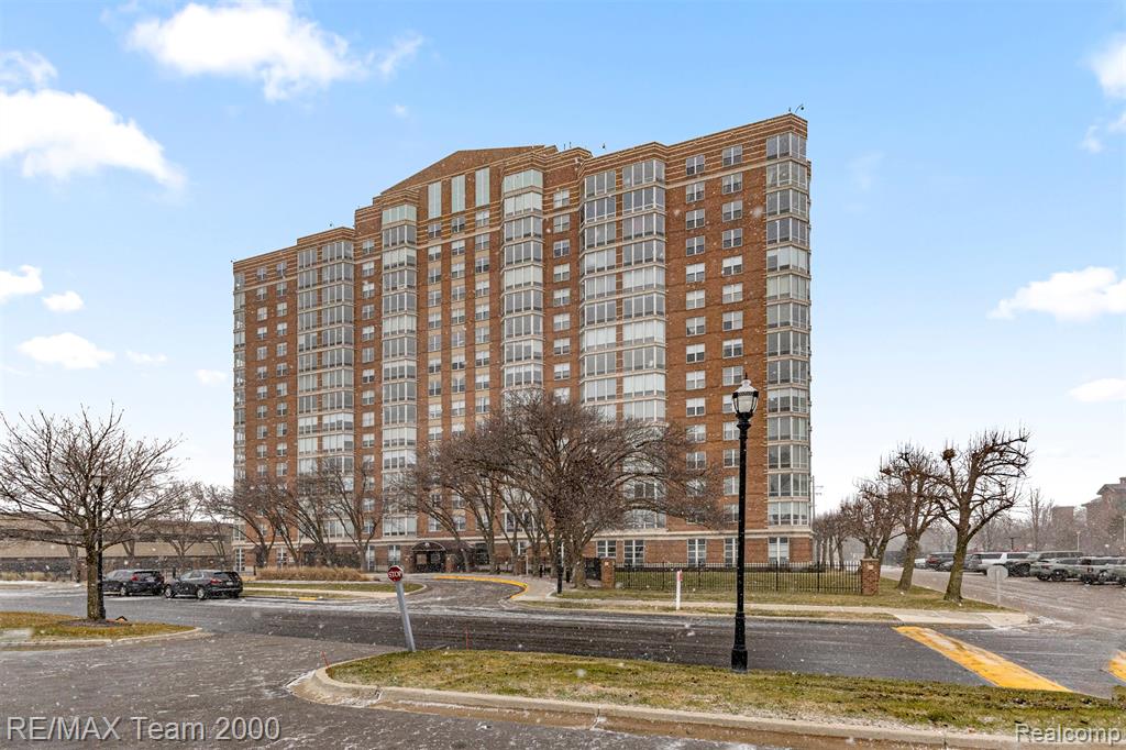 250 E HARBORTOWN Drive, 702, Detroit, MI 48207 — front exterior