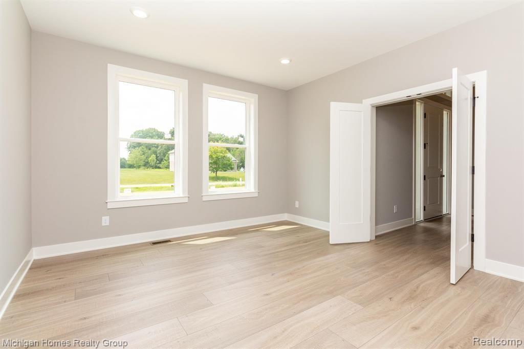 2910 LOON Drive, Wixom, MI 48393 — Photo 62