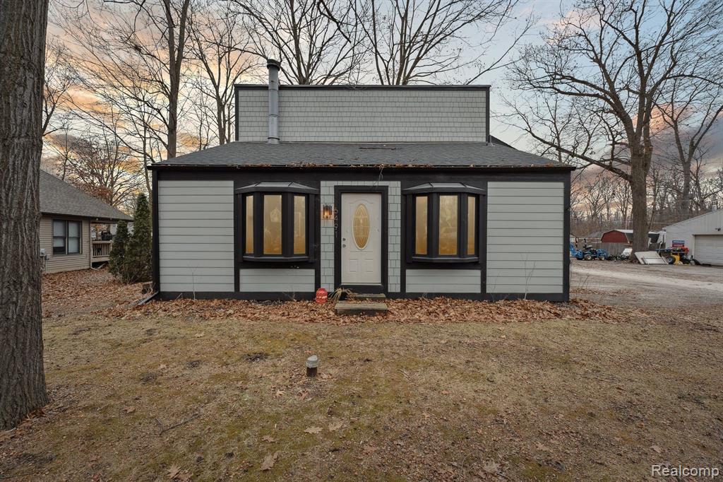 6491 WOODLAND Road, Whitmore Lake, MI 48189 — front exterior