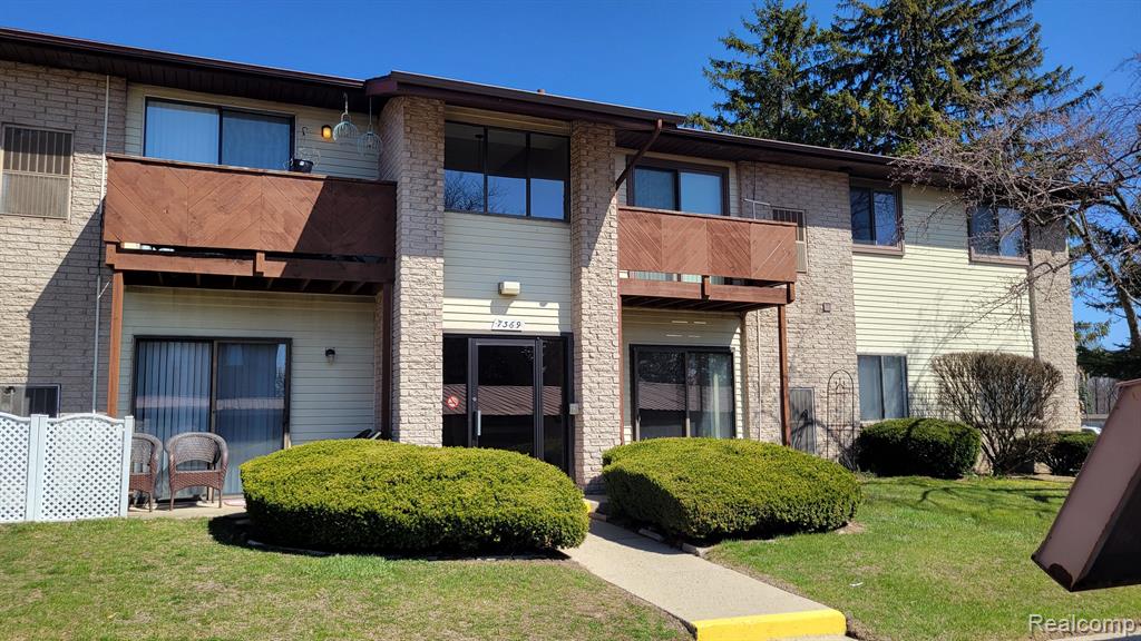7369 MANOR Circle, 101, Westland, MI — front exterior