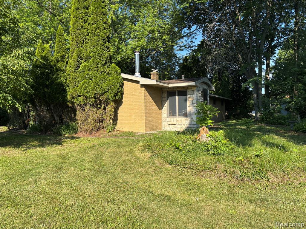709 E Michigan Avenue E, Au Gres, MI 48703 — Photo 3