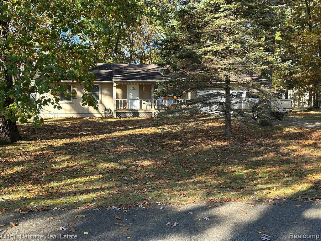 9418 Charlie Brown Lane, Pinckney, MI 48169 — front exterior