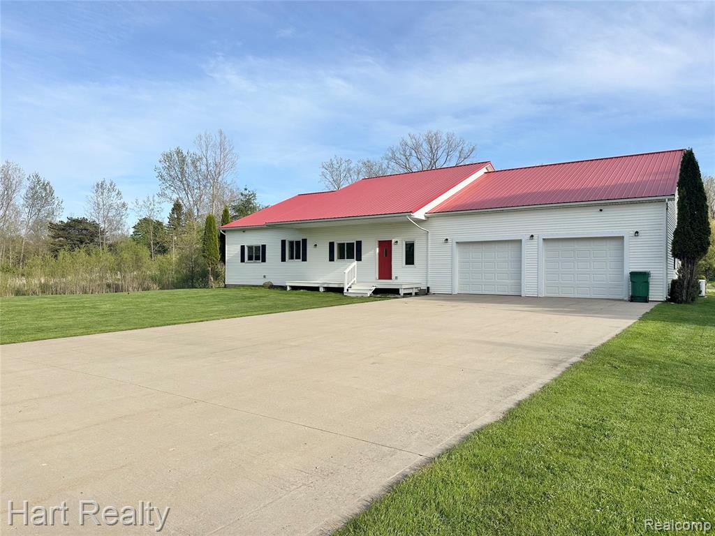 7982 Heinemann Road, MI — front exterior