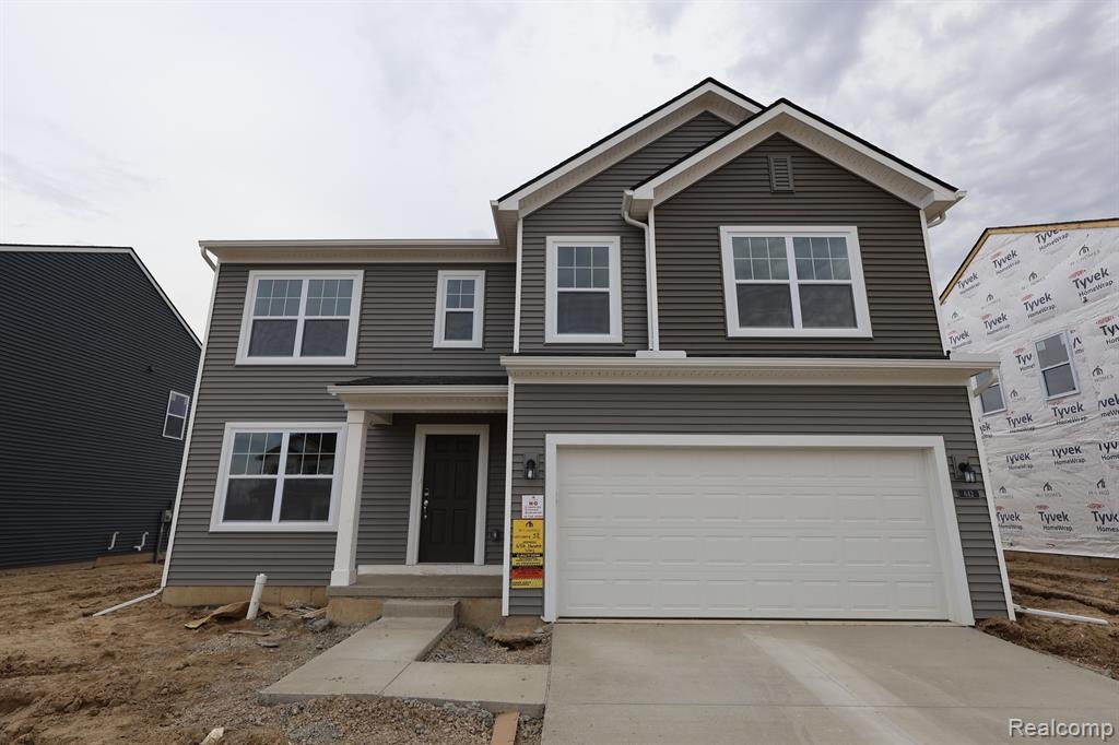 642 Harvest Way, Chelsea, MI 48118 — front exterior