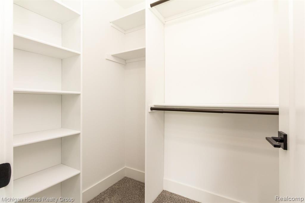 2910 LOON Drive, Wixom, MI 48393 — Photo 59