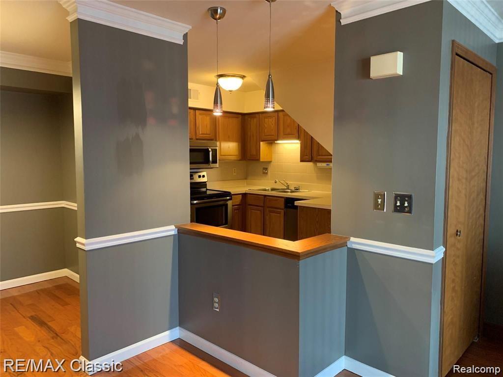 254 PINEWOOD Drive, 67, Plymouth, MI 48170 — Photo 5