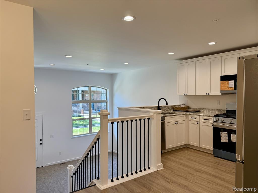 435 Village Drive, Walled Lake, MI 48390 — Photo 9