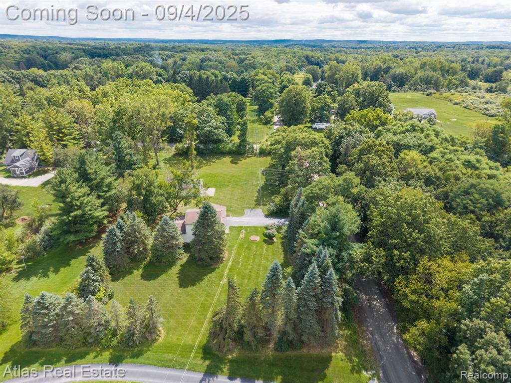 8557 Henderson Road, Goodrich Vlg, MI — Photo 4
