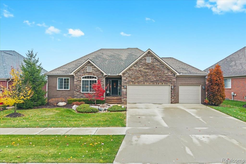 62876 Sawgrass Drive, Washington, MI — front exterior