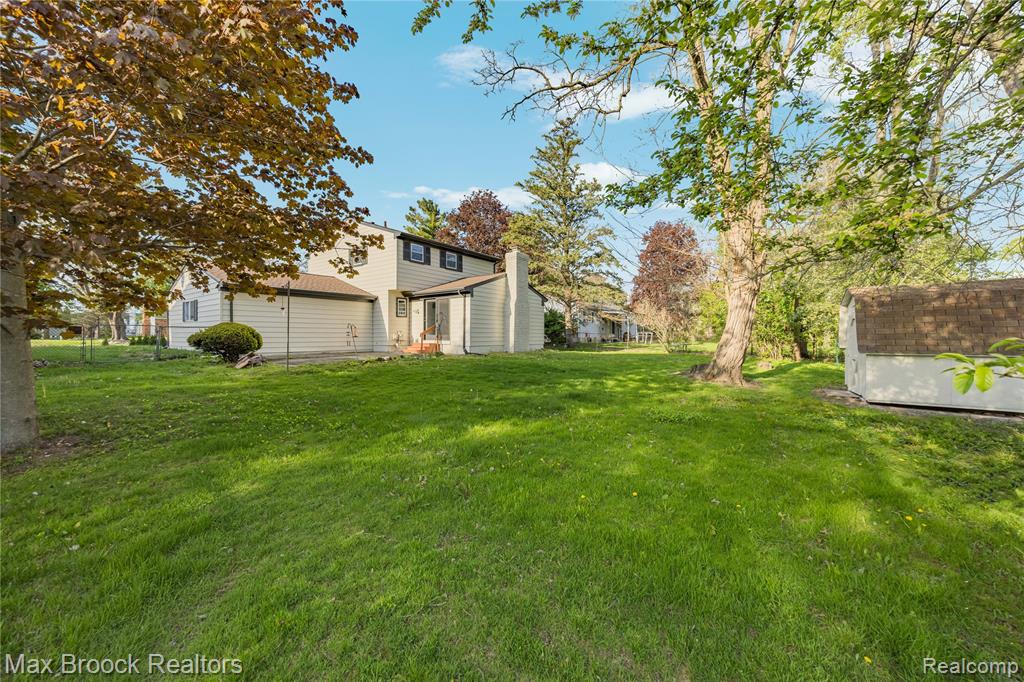 1874 Hopkins Drive, Wixom, MI 48393 — Photo 47